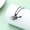 starlight urns guitar urn necklace – memorial jewelry for musicians and music lovers