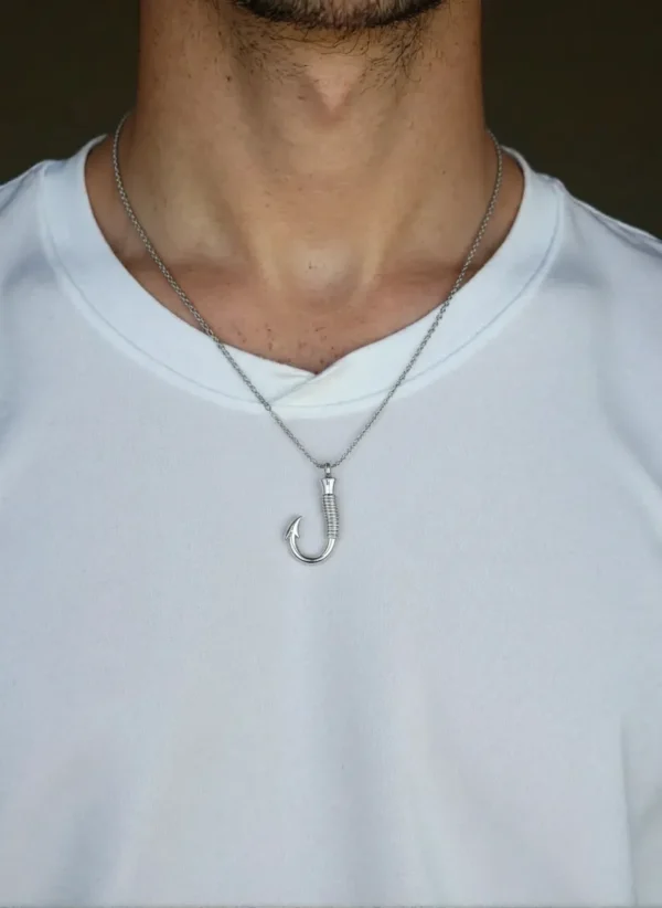 man wearing fish hook urn necklace