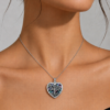 Urn necklace heart on womans neck